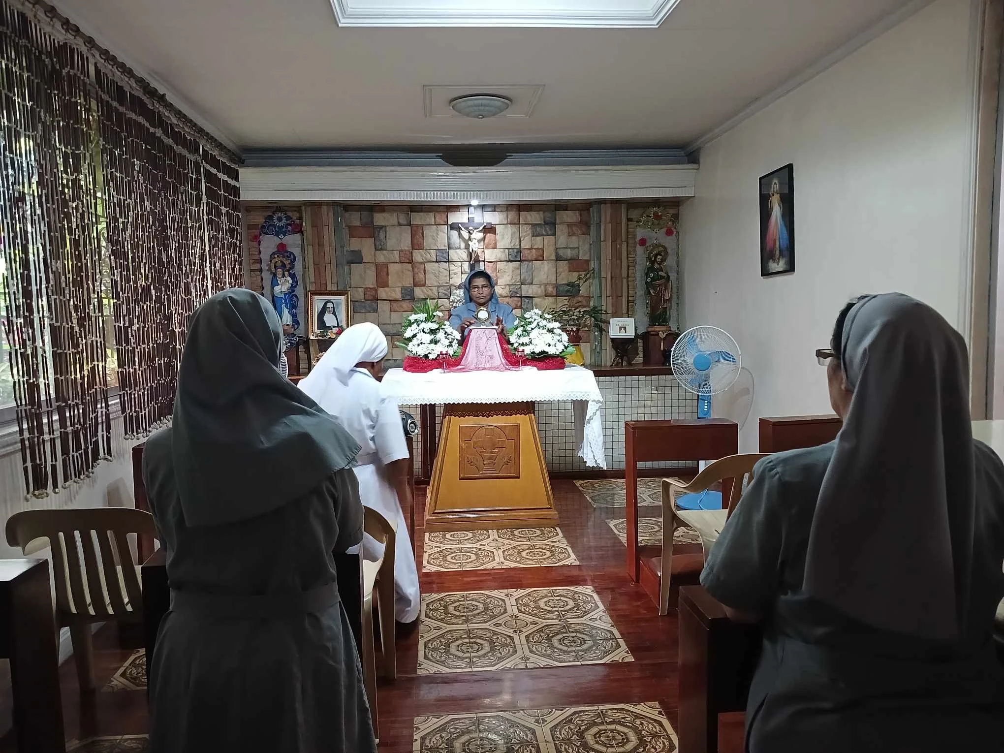 Sisters praying together in the chapel