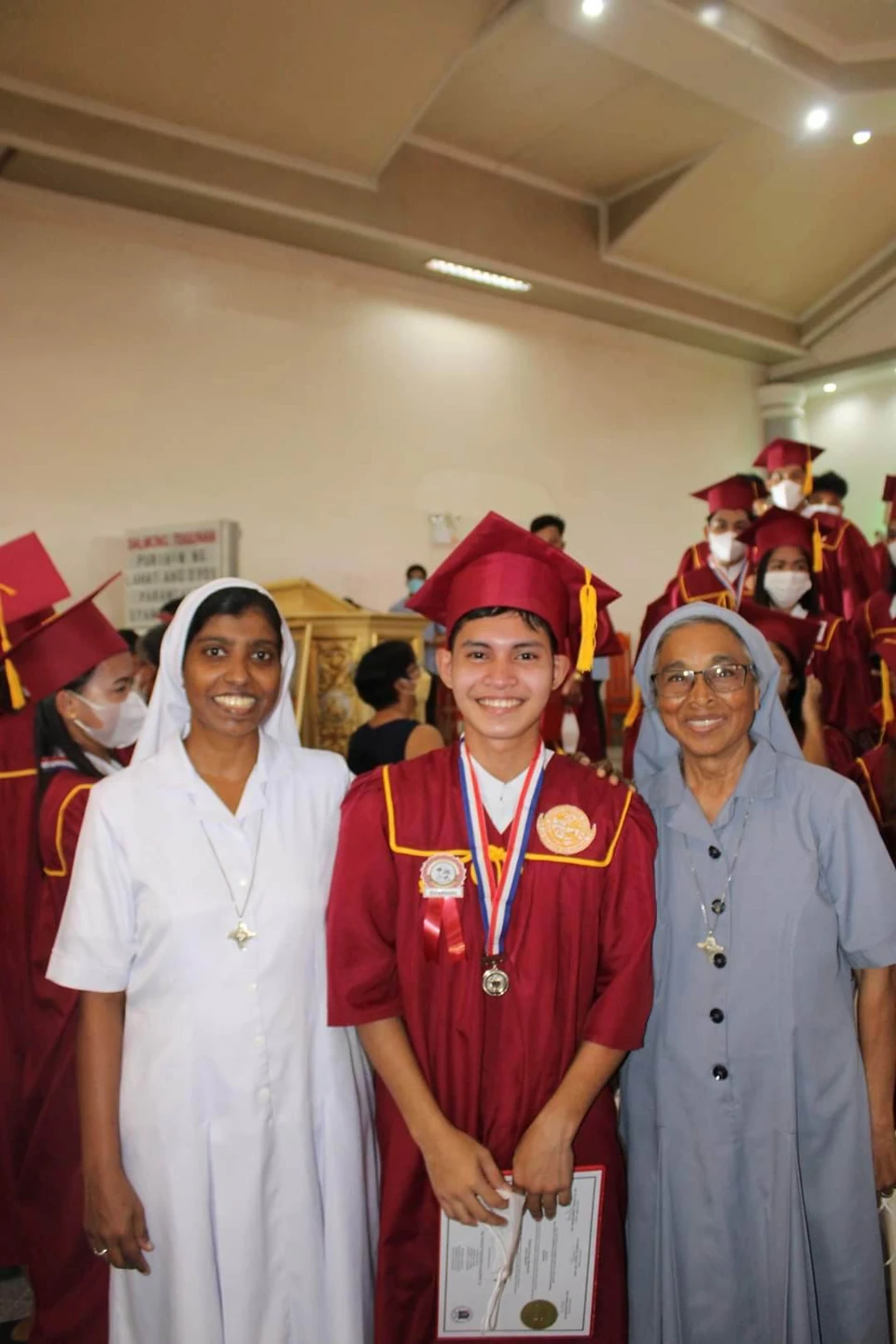 Sisters together with a guest during a celebration