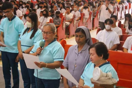 Sisters and parishioners participating in a church celebration