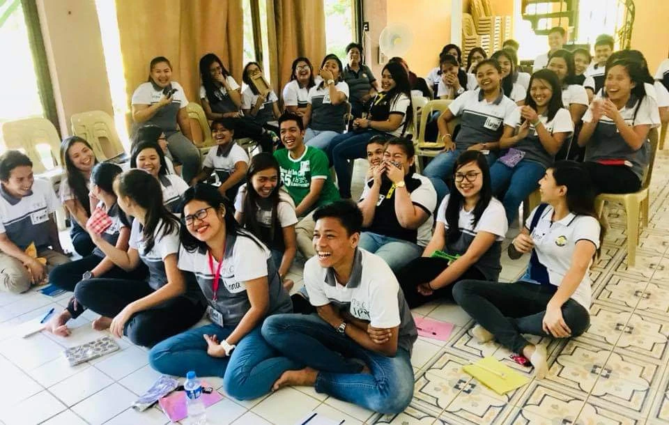 Young people and sisters gathered for a community activity